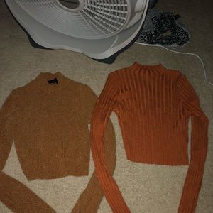 bundle of two long sleeve turtlenecks